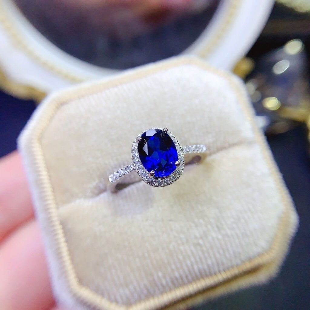 1.2ring<$3series21Elegant Oval Sapphire Ring with Diamond Halo - Fine Jewelry